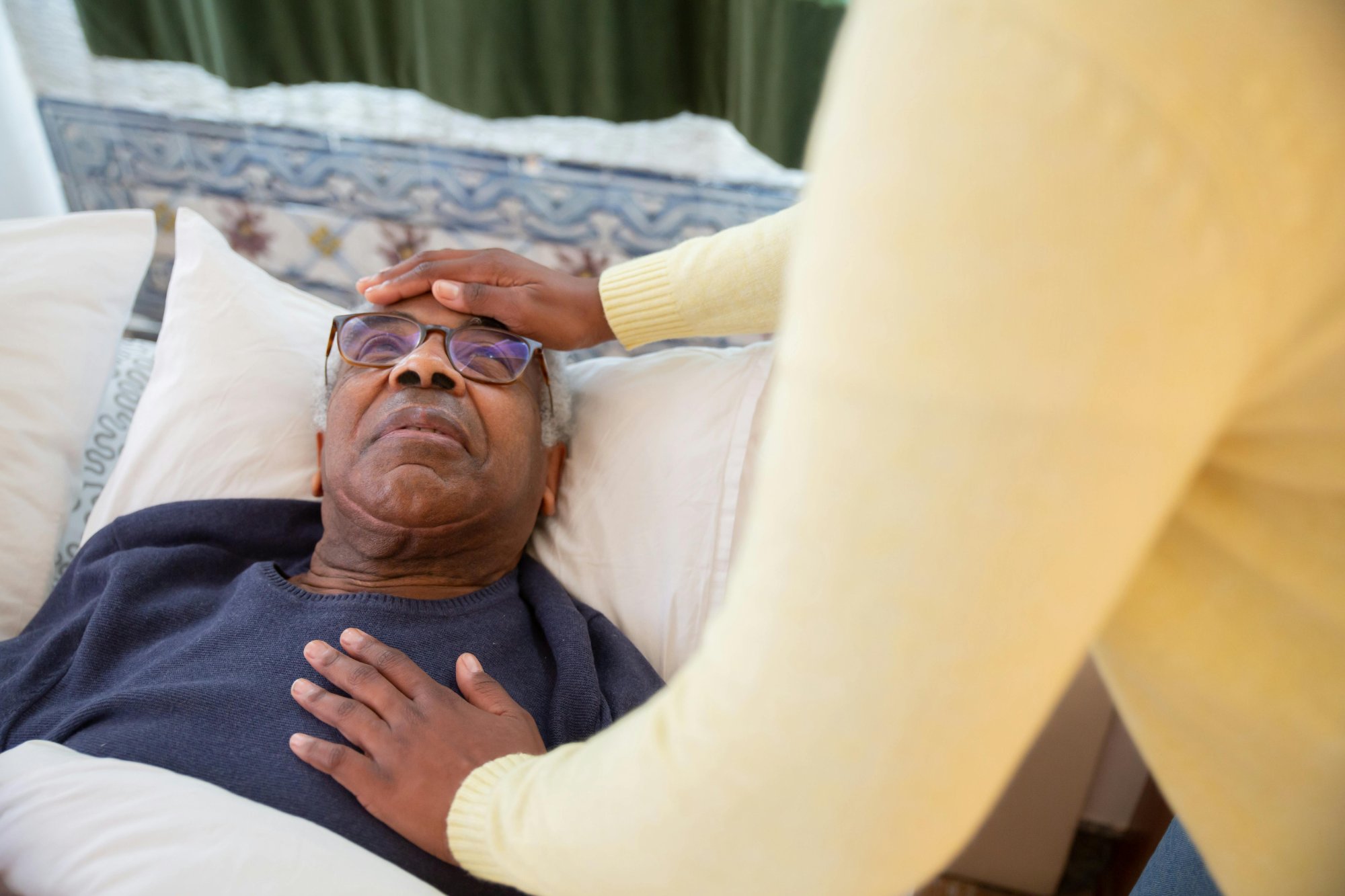 Compassionate caregiver supporting an elderly client
